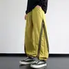 Calça funcional externa da moda estilo americano para homens, nova coleção primavera/outono, casual, corte solto, tamanhos grandes, versátil, calça atlética de perna reta