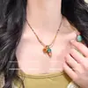 Estilo nuevo de primavera y verano, cadena para clavícula con colgante de florcitas de colores, collar para mujer con colgante de manzana roja lindo