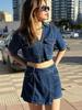 Traje de pantalón y falda vaquera de cintura alta, camisa vaquera corta popular de estilo europeo y americano, suéter de punto con cuello en V y doble botonadura, transfronterizo