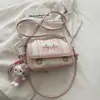 Bolso de Hombro Único con Cara de Gato a Cuadros para Mujer 2026 Nuevo Dibujo Animado Lindo Versátil de Gama Alta Diseño de Nicho Pequeño Bolso Cuadrado Cruzado