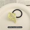 Anillo elástico para el cabello cóncavo-convexo de metal con personalidad de diseño de nicho, cuerda para el cabello de estilo frío que combina con todo, cuerda para la cabeza de temperamento retro europeo y americano.