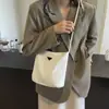 Bolso Cubo Casual de Moda para Llevar en la Mano para Mujer 2024 Nuevo Estilo Coreano Moda Nicho Bolso de Hombro para el Trabajo Commuter Bolso Cruzado