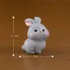 Paisagem em miniatura criativa fofa família de coelhos boneca animal decoração acessórios mini mesa resina pequenos enfeites