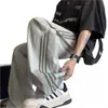 Pantalones anchos de tres rayas para hombre, verano finos de seda de hielo de secado rápido, fluidos rectos, estilo juvenil de alta calle americana