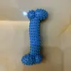 Juguetes para Mascotas Juguetes para Perros TPR Tamaño Hueso Barba Dientes Molares Limpieza y Juguetes Resistentes a la Mordida Fábrica en Stock