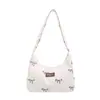 Bolso de hombro de alta gama, nuevo y elegante bolso de lona de mezclilla para mujer, bolso tote dulce y versátil con lazo, estilo casual