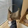 Bolso de Mujer Casual Estilo Coreano de Cuero y Felpa 2026 Otoño/Invierno Nuevo Versátil de Alta Gama Gran Capacidad para Viajes Diarios Bolso de Hombro Único Bolso Tote