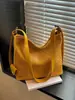 Bolsa Saco Estilo Coreano Nicho Padrão Trançado Preguiçoso para Mulheres, Nova Bolsa de Ombro Transversal Tendência Fashion para o Dia a Dia