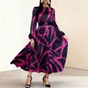 Nuevo vestido casual de manga larga de talla grande, suelto, de estilo europeo y americano, transfronterizo, para mujer, vestido midi estampado elegante y a la moda