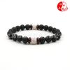 Pulsera explosiva transfronteriza directa de fábrica piedra flash natural piedra volcánica pulsera de piedra de hierro negro joyería al por mayor