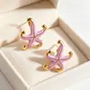 Novos brincos de design minimalista criativo da moda transfronteiriça, brincos de tarraxa de aço inoxidável com pingente de estrela-do-mar e pentagrama com esmalte gota de óleo