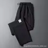 Pantalones de aire acondicionado exclusivos de seda helada transfronterizos, finos, talla grande para hombre, holgados, transpirables, de secado rápido, casuales, de pierna recta, estilo jogger, largos