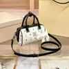 Bolsa Boston de Couro Genuíno Mais Vendida Internacionalmente Bolsa Almofada Feminina Nova Tendência Moderna Bolsa de Ombro Transversal Bolsa de Mão Estampada