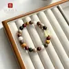 Pulsera de Madera Natural Dieciocho Semillas Hilo de Mano Hecha de Madera Original Estilo Étnico para Mujer Cuentas de Muchos Tesoros Wenwan Cuentas Budistas Cuentas de Oración Mano