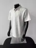 Camiseta Masculina Polo Americana High-End Manga Curta Ombro Direito Design de Costura Desconstruído Cor Pura Simples Solta Meia-Manga