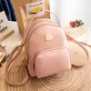 Bolsa de ombro pequena e fresca para mulheres, moda coreana, cor sólida, mochila pequena, logo quadrado, transversal, comércio exterior, bolsa pequena de PU, atacado em Guangzhou