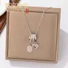 Colar de borla de diamante com esmalte de gota de luxo leve estilo francês microincrustado para mulheres, corrente de clavícula doce de dopamina da moda de alta qualidade