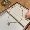 2025 Nueva Moda Colgante de Corazón Diseño de Nicho Collar Cadena de Clavícula para Mujer Tendencia Dopamina Accesorios Venta al por Mayor