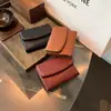 Bolso de Mujer 2026 Nuevo Estilo Cartera con Patrón de Lichi Cartera Plegable Corta para Mujer Portatarjetas de Gran Capacidad Comercio Exterior Venta al por Mayor Transfronteriza