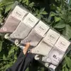 Meias esportivas de algodão para mulheres, trama de mil pés, comprimento até o meio da panturrilha, tricô à máquina integrado, meias de algodão, cor sistema Maillard café com leite de moca, 26 Outono/Inverno