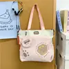 Bolso tote nuevo para estudiantes, gran capacidad, perfecto para sesiones de tutoría, diseño moderno color-blocking, patrón de dibujos animados lindo, gran capacidad, adecuado para ir al trabajo y llevar libros