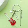 Diseño Creativo Plata Vintage Saxofón Cinta Musical Llavero Transfronterizo Más Vendido Colgante de Bolsa Pequeño Accesorio