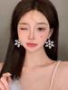 Invierno Navidad exquisito clip para la oreja sin oreja diseño de copo de nieve de diamante flash aretes para mujer de alto sentido para mujer pendientes de nicho de lujo ligero