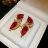 Pendientes de plata chapada en oro real de 18 quilates con aguja de plata y colgante de gota de agua de circonita, pendientes de lujo ligero de alta gama, pendientes vintage resistentes para mujer
