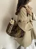 Otoño/Invierno 2026 Nuevo Estilo Coreano Bolso de Axila de Felpa con Estampado de Leopardo Perezoso Bolso de Hombro Único de Piel Atmosférico