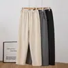 Foto real de pantalones de pierna ancha tipo guadaña, nuevo estilo otoño e invierno, versátiles, sencillos, cintura elástica, estampado de espiga, pantalones deportivos casuales de largo completo para mujer