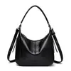 Bolso de hombro simple para mujer 2026 nueva moda bolso de axila para mamá gran capacidad estilo casual bolso de mano bolso cruzado