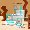 Caja colgante de película de PE de color de moda, película transparente, a prueba de polvo, para exhibir y empaquetar monedas, joyas y otros coleccionables