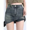 Falda corta de mezclilla estilo americano para mujer, nuevo modelo verano 2026, talla grande, adelgazante, sexy ajustada que realza las caderas falda-pantalón, media falda de cintura alta