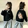 Nueva Ropa de Primavera y Otoño para Niñas Elegante Camiseta de Punto Waffle de Manga Larga Falsa de Dos Piezas para Bebés Capa Base Casual Moderna
