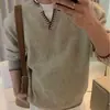 Suéter de malha falso de duas peças moderno com gola redonda para homens, jaqueta de malha versátil e solta casual para outono e inverno, tamanhos grandes