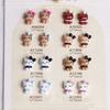 Arte de uñas de cuero negro Hello Kitty KT Bow Tridimensional Wear Armor Resin Mini HelloKitty Cat Bow Tie Rosa