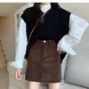 Falda de pana simple y versátil de cintura alta adelgazante para mujer, nueva y elegante falda midi de línea A para otoño e invierno 2026