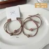 2 piezas de gomas para el pelo de alta elasticidad con pequeñas cuentas doradas, diademas sencillas, cuerdas para el pelo versátiles estilo coreano que no dañan el cabello
