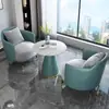 Juego de sofá de un asiento y mesa de centro para recepción de hotel, sala de reuniones de clientes, oficina de ventas, salón de belleza, centro comercial, mueble de sala de exposición, gama alta