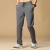 Pantalones cortos populares para jóvenes, marca de moda japonesa para hombres, pantalones casuales de color sólido, pantalones deportivos holgados de seda de hielo de primavera.
