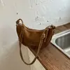 Versátil bolsa de axila para el uso diario, nueva bolsa de hombro cruzado retro de nicho de verano para mujer, bolsa de albóndiga