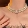 Collar de Perlas con Lazo y Diseño de Lujo Ligero, Sensación de Alta Gama, Cadena de Clavícula Moderna, Cadena de Cuello Elegante de Cristal Estilo Europeo y Americano para Mujer, a la Moda