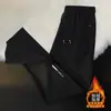 Calça esportiva casual masculina de inverno com forro de fleece, nova, moderna, de corte solto, com bolsos, zíper, estilo jogger, calça de moletom longa reta