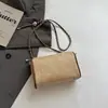 Nova bolsa de corrente estilosa para mulheres, bolsa de ombro de corrente de nicho de alta qualidade, bolsa de mão, bolsa transversal com padrão trançado moderna e simples