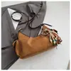 Bolso bandolera retro de nicho coreano tipo bolsa de albóndiga para mujer Otoño 2025 Nuevo Bolso de hombro cruzado moderno y simple de alta gama