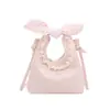 Mini bolso de lunares estilo coreano para mujer, mochila casual con lazo fresca y linda, bolso cruzado versátil para niñas de compras