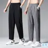 2024 Verão Nova Calça de Seda Gelo Homens Cor Sólida Moda Marca Calças Esportivas Folgadas Justas Casual All-match Calças Masculinas