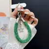 Pulseira de celular colorida e estilosa, cordão de pulso, alça de mão curta multifuncional, pingente de chaveiro, nova pulseira de celular