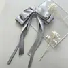 2026 Nuevo Modelo Cinta Plateada Mariposa Pinza de Resorte Nudo Pinza para el Cabello de Mujer de Gama Alta Adorno para el Cabello con Cinta Danzante Adorno para el Cabello de Ballet