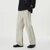 Pantalones casuales retro de algodón puro estilo americano para hombre, con un diseño único de patchwork deconstruido, corte holgado, perneras rectas y una silueta amplia y fluida, adecuados para primavera y otoño.